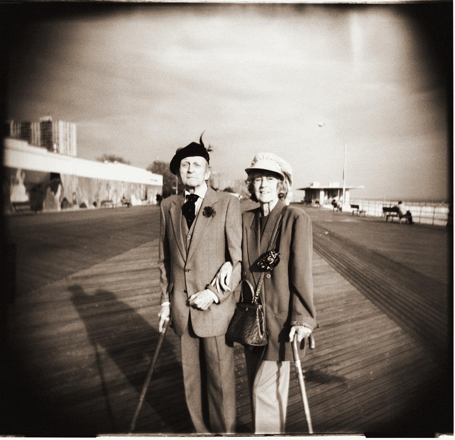 Elderly Couple On Boardwalk, Portrait Photograph by Rob Goldman