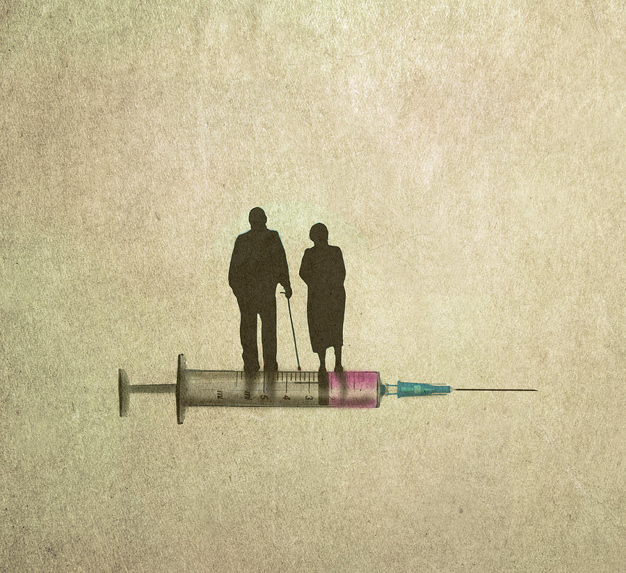 Elderly Couple Standing On Syringe Photograph by Ikon Images