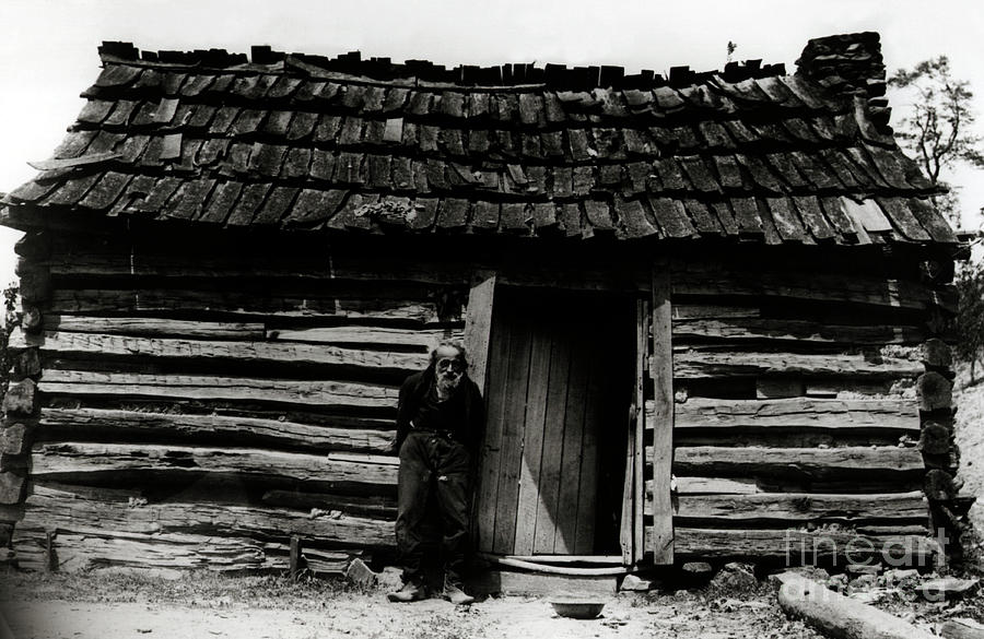 Elderly Man Outside His Cabin by Bettmann