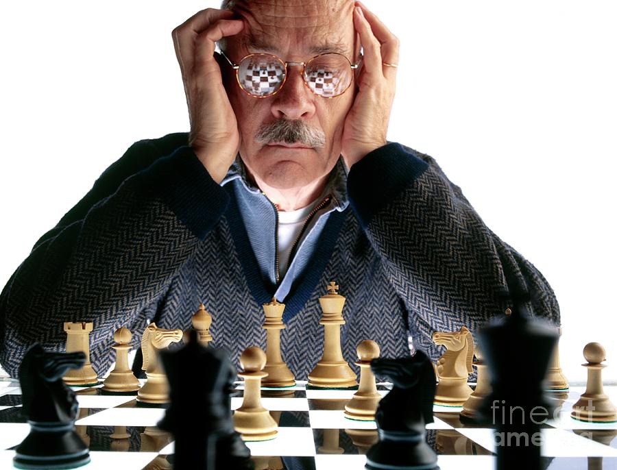 Elderly Man Plays A Game Of Chess Photograph by Oscar Burriel/science Photo Library