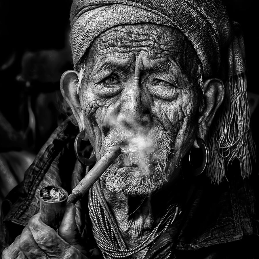 Black And White Photograph - Elderly Smoker by Sergio Pandolfini