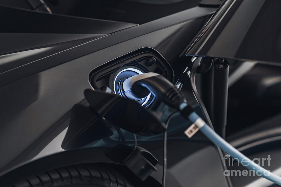 Electric Car Charging Photograph by Microgen Images/science Photo Library