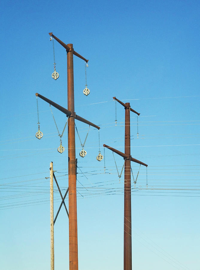 Electric Line Pulleys Photograph by Marilyn Hunt