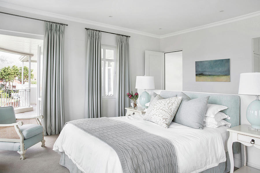 Elegant Bedroom In Pale Blue-grey With Partition Wall At Head Of Bed Photograph by Great Stock!