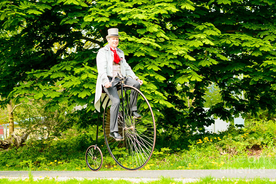 Elegant man on penny-farthing Photograph by Ingemar Magnusson | Fine ...