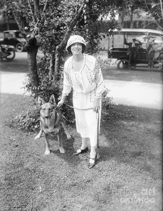 Elizabeth Arden Walking Her Dog Photograph by Bettmann