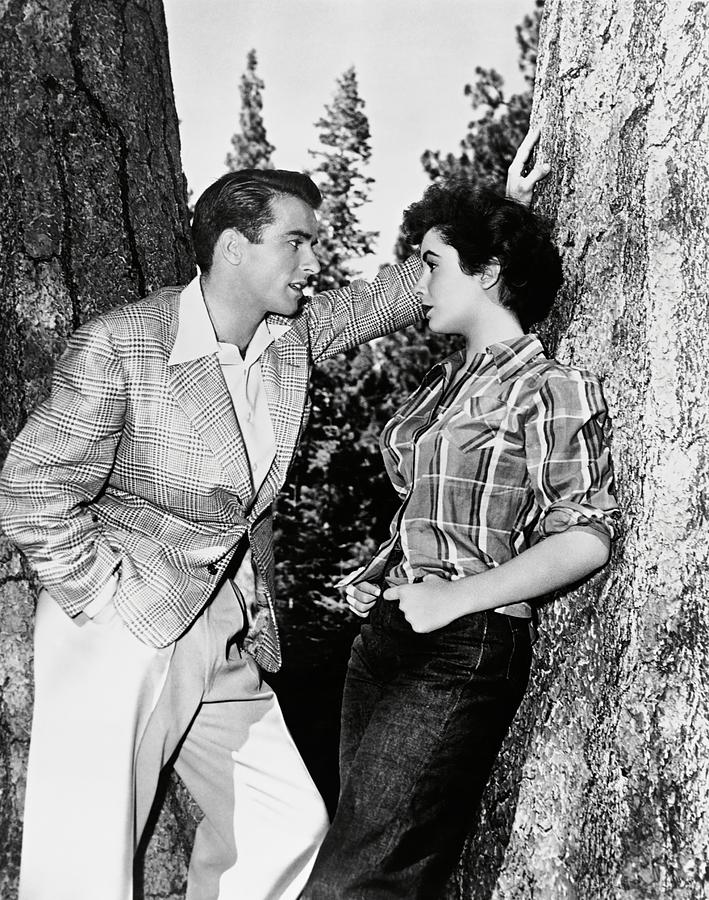 ELIZABETH TAYLOR and MONTGOMERY CLIFT in A PLACE IN THE SUN -1951-. Photograph by Album