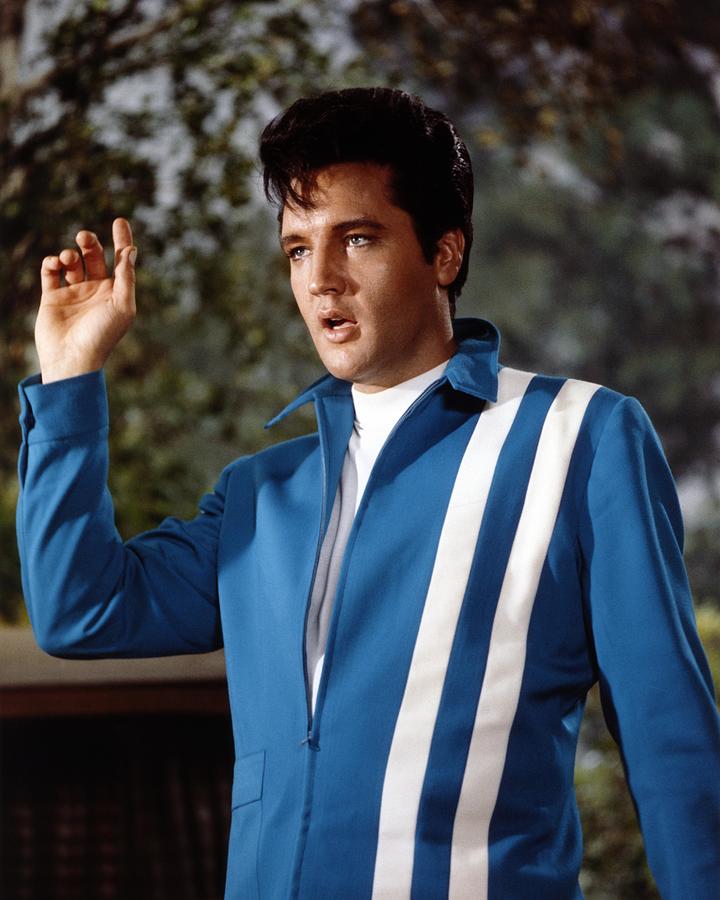 Elvis Presley Gesturing While Looking Away Photograph by Globe Photos ...