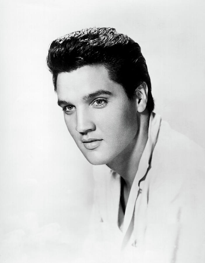 Elvis Presley: Handsome Star On White Photograph by Globe Photos - Fine ...