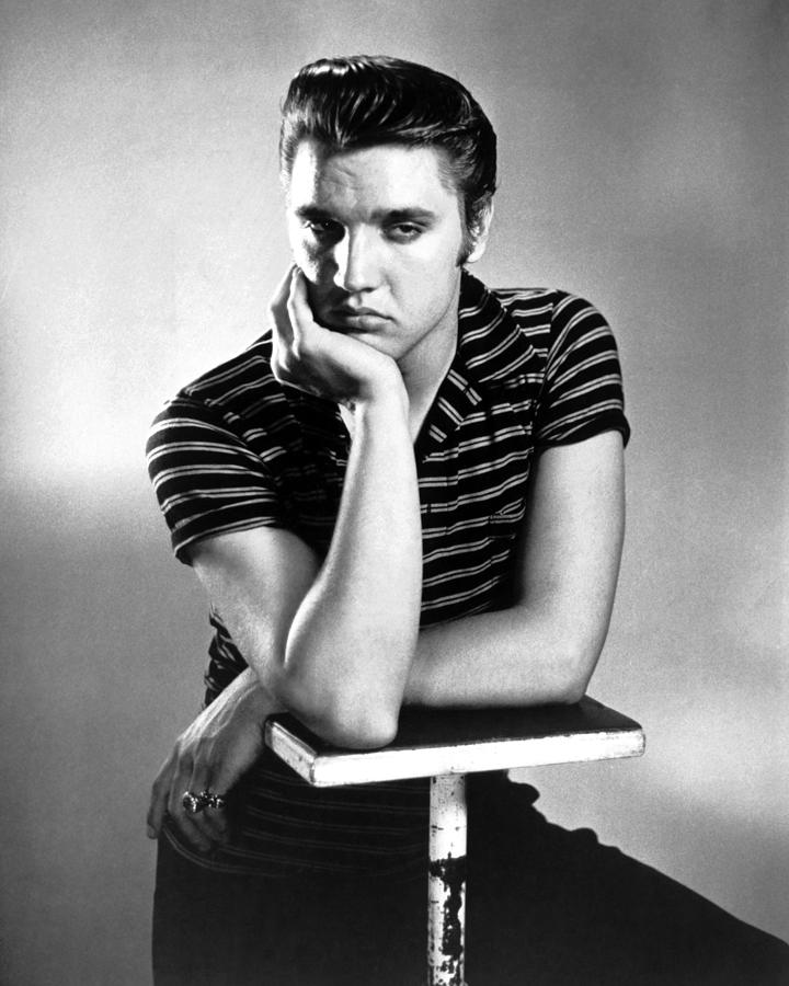 Elvis Presley Leaning On Pedestal And Looking Away Photograph by Globe ...