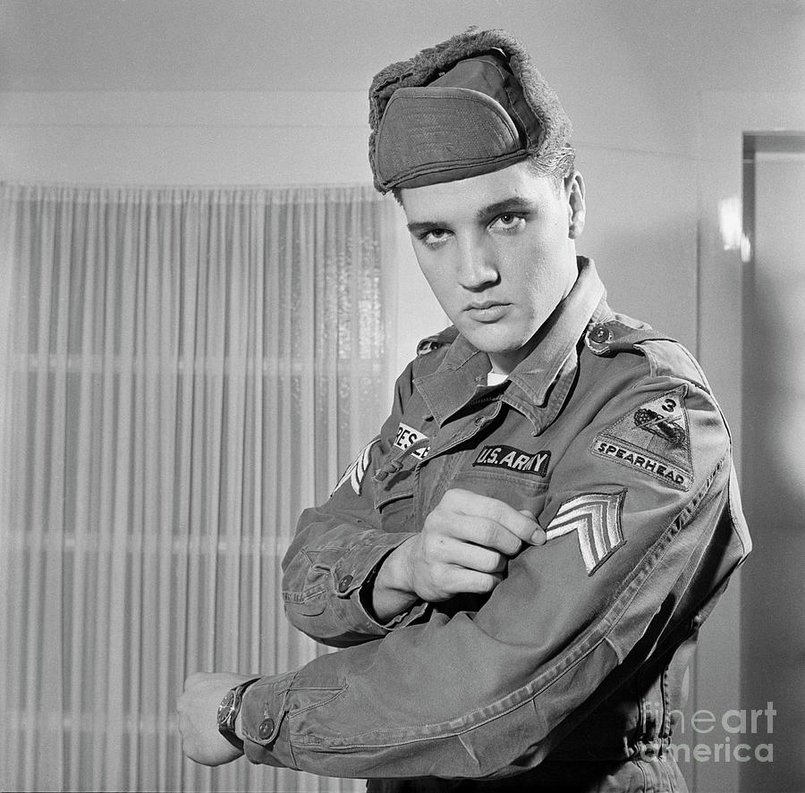 Elvis Presley Showing His Army Stripes Bettmann 