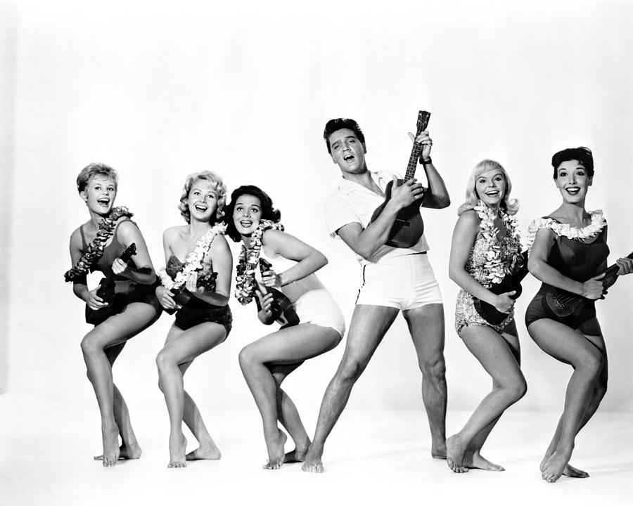 Elvis Presley Photograph - Elvis Presley Singing And Playing Guitar With Women by Globe Photos