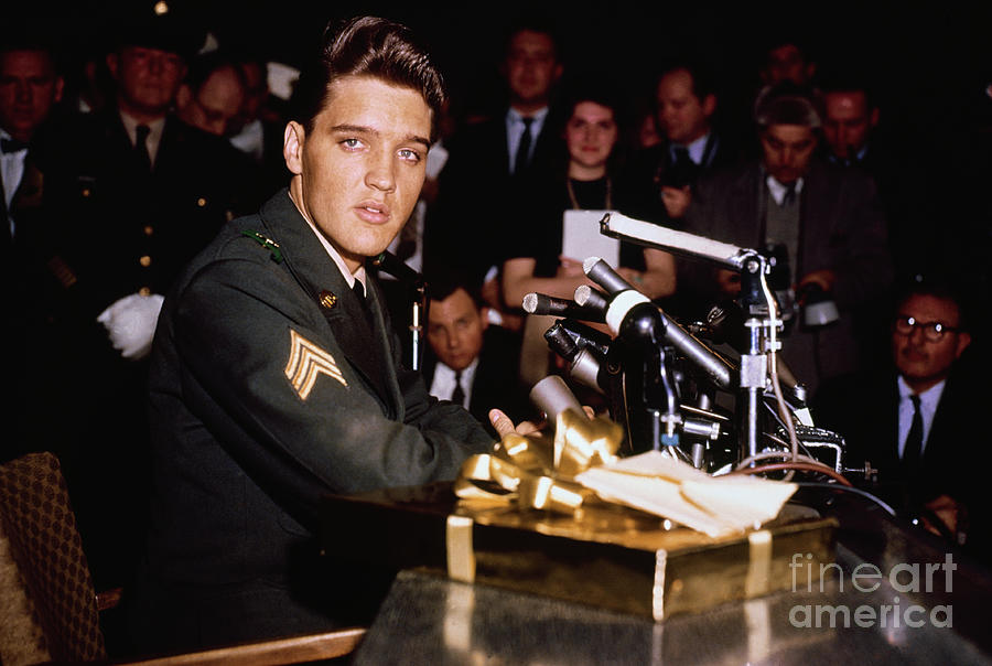 Elvis Presley Photograph - Elvis Presley Speaking At Press by Bettmann