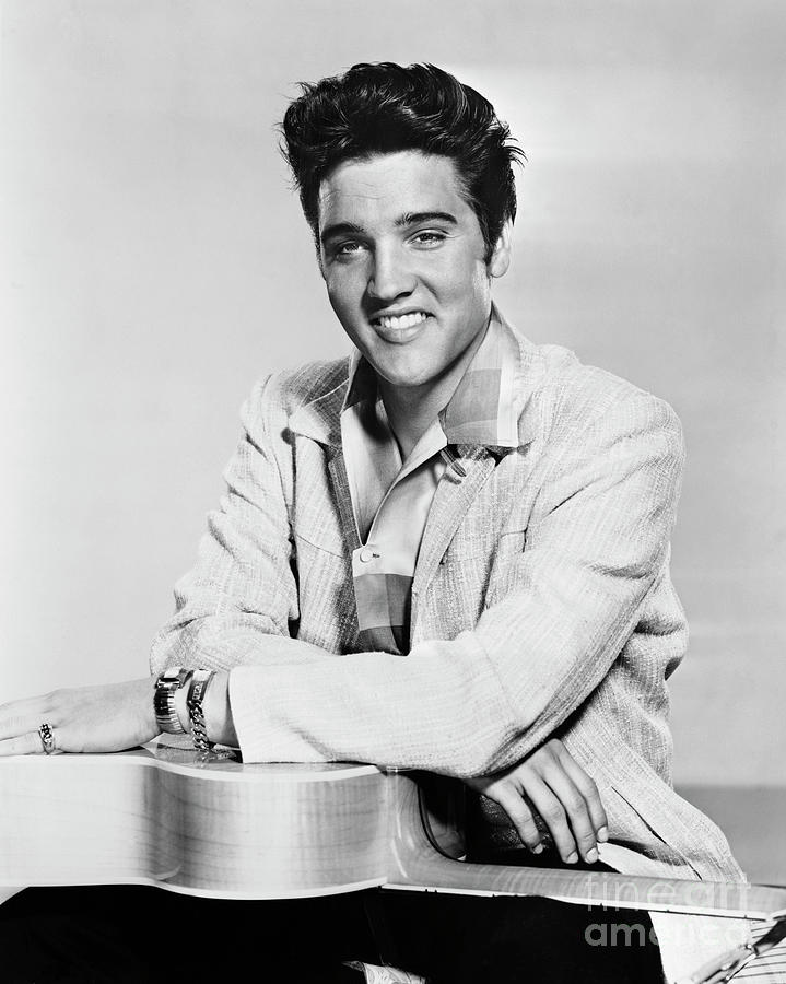 Elvis Presley With Guitar Photograph by Bettmann