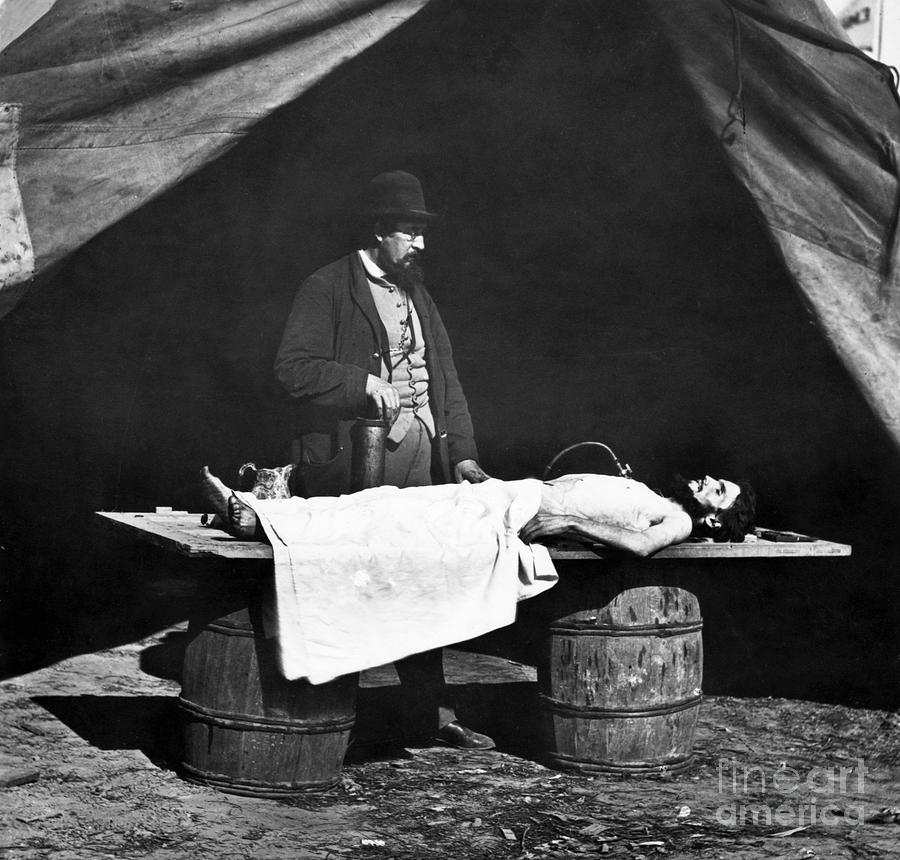 Embalming Surgeon With Soldiers Corpse Photograph by Bettmann