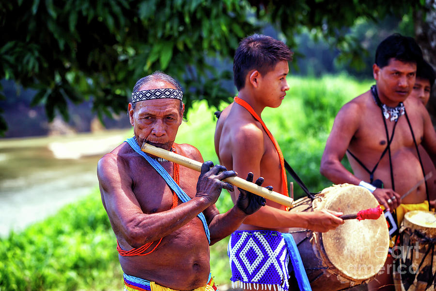 City Photograph - Embera Flute Player in Panama by John Rizzuto