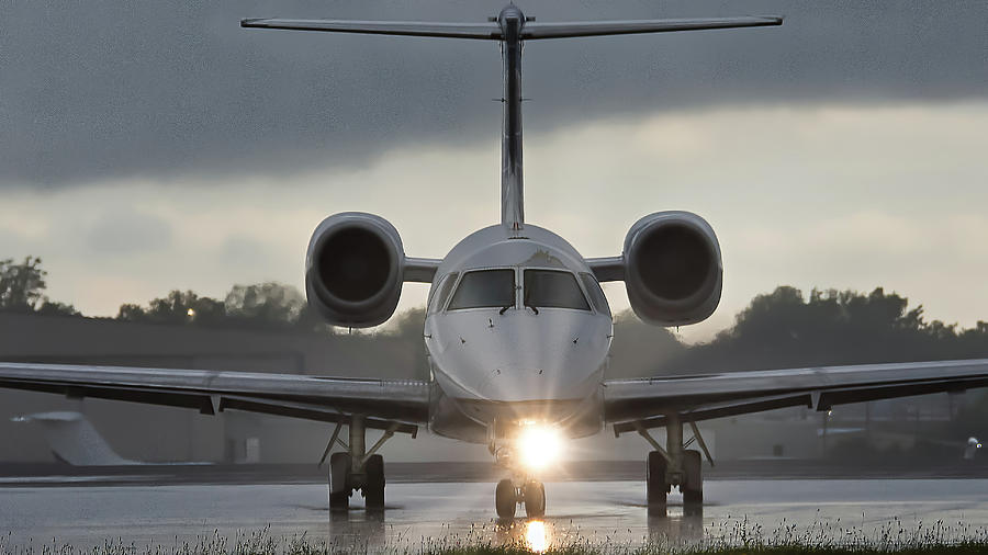 Embraer 145 Photograph by Guy Whiteley