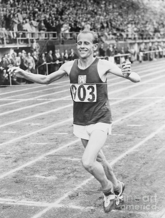 Emil Zatopek Finishing Track Race Photograph by Bettmann