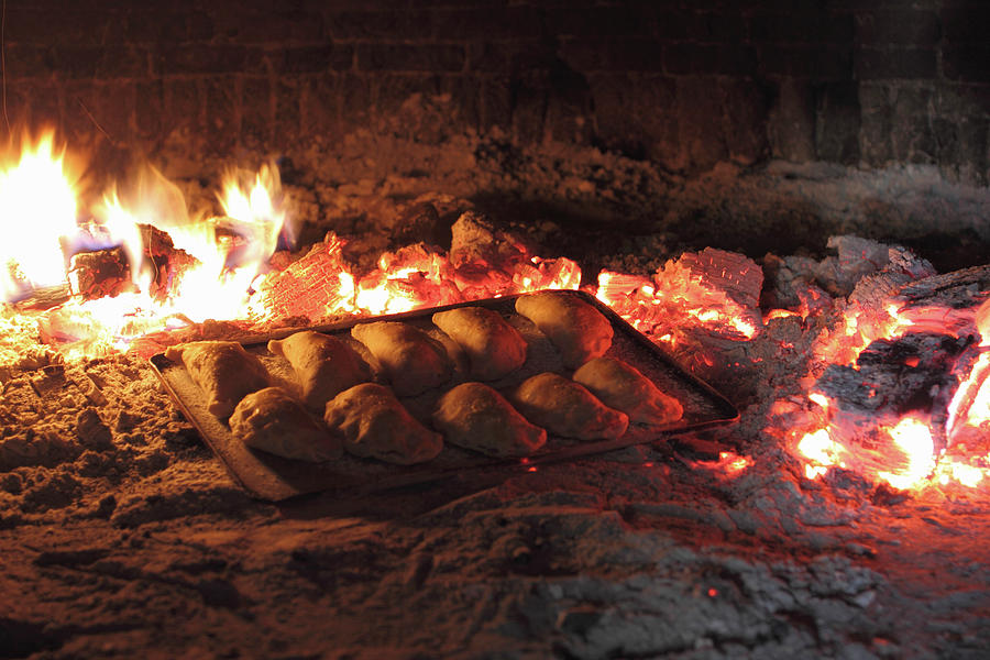 Empanadas In Wood Fired Oven Photograph by Lee Parish