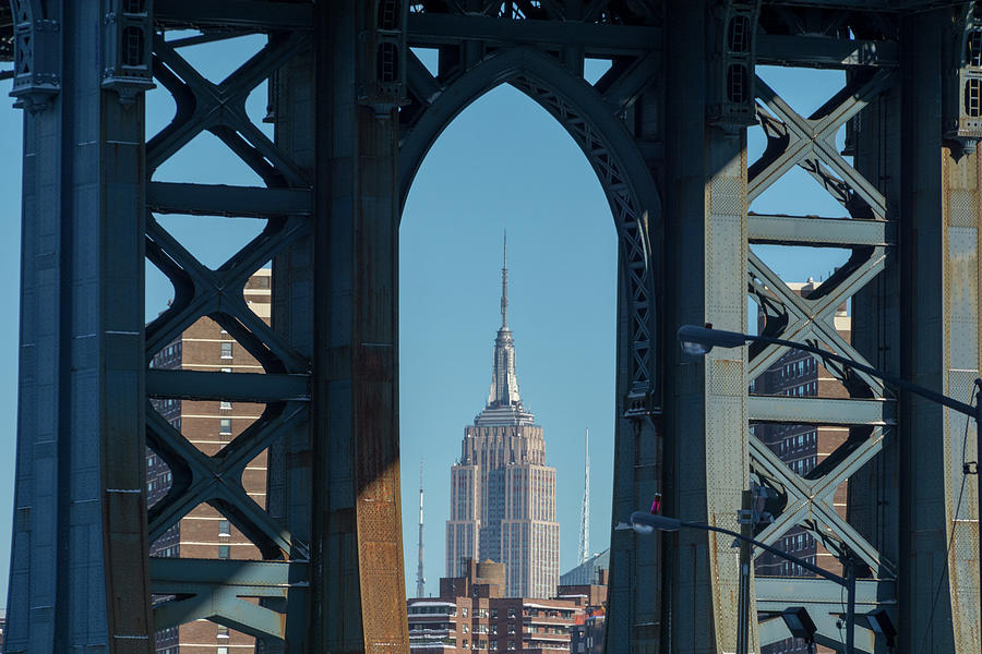 Empire State Building through the Manhattan Bridge Photograph by Mark Hunter