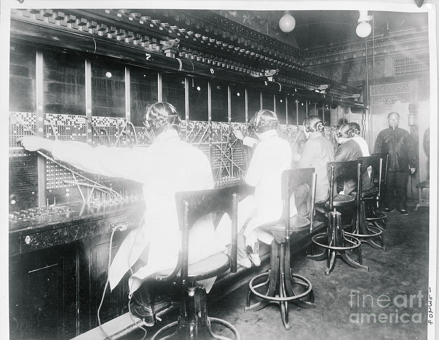Employees In Switchboard Room Photograph by Bettmann