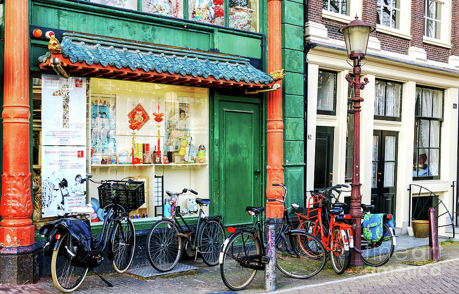 Empty Bikes in Amsterdam Chinatown Photograph by John Rizzuto