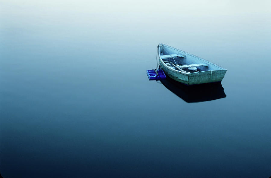 Empty Boat On The Sea Water Photograph by Kathy Van Torne
