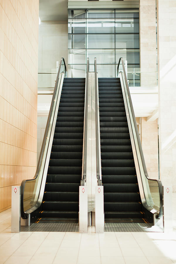 Empty Escalators In Lobby Photograph by Hybrid Images