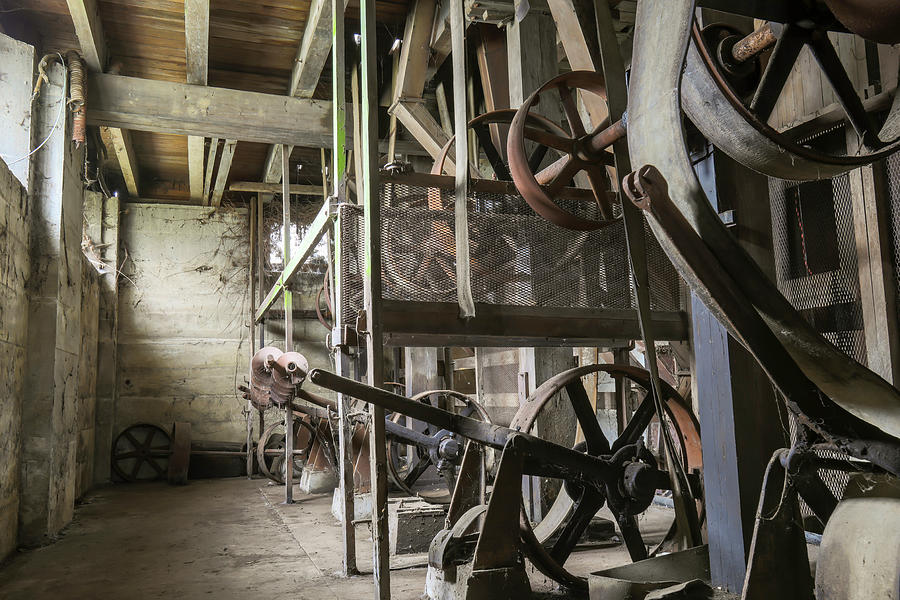Engines in basement of belt driven grist mill Photograph by Karen Foley