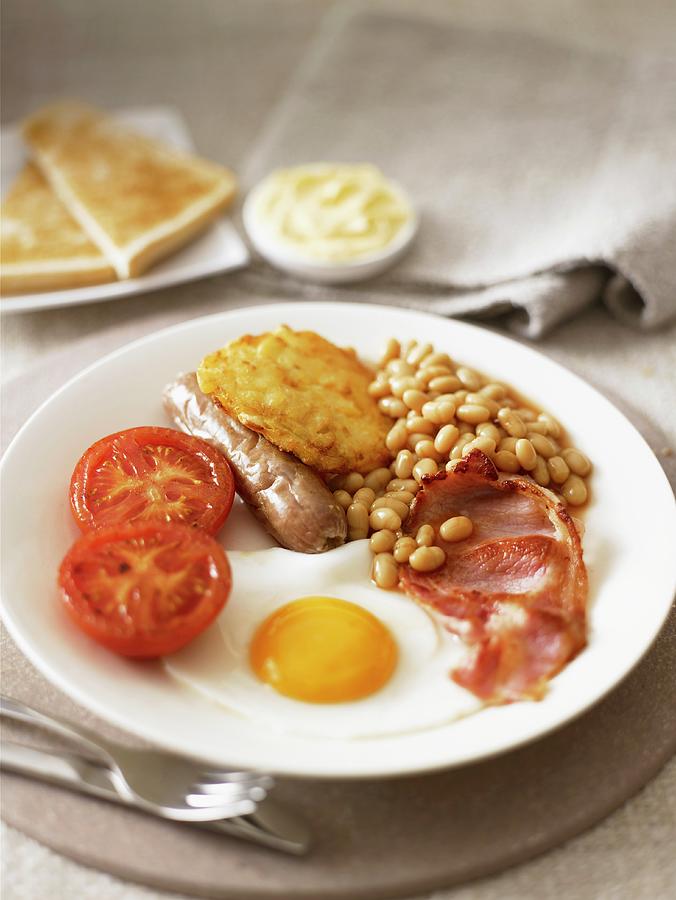 English Breakfast With Fried Egg, Bacon And Baked Beans Photograph by West, Stuart