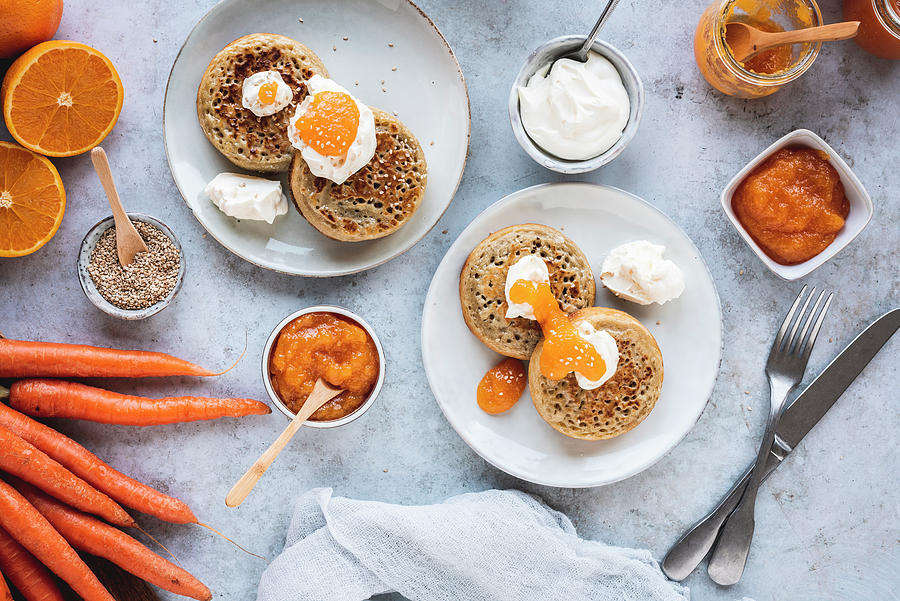 English Crumpets With Orange And Carrot Jam Photograph by Christian Kutschka