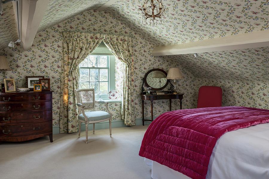 English-style Attic Bedroom With Floral Wallpaper On Walls And Ceiling ...