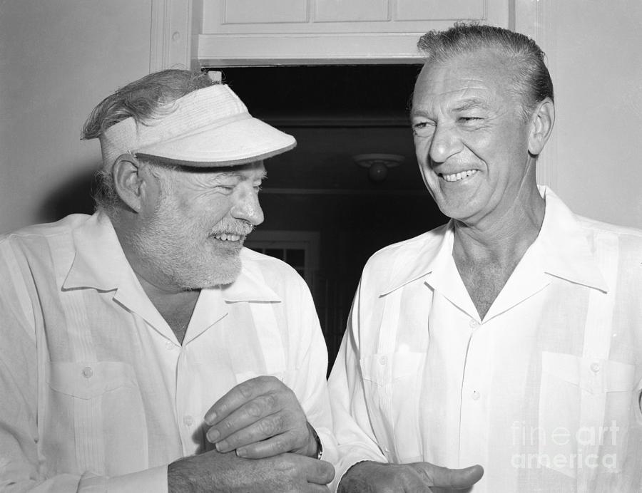 Ernest Hemingway Talking With Gary Photograph by Bettmann