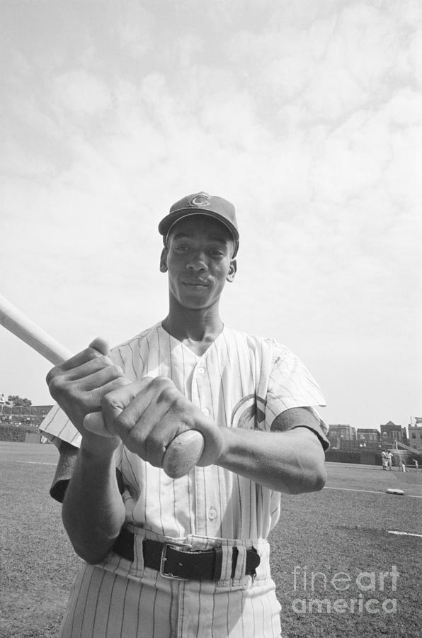 Ernie Banks Holding Baseball Bat by Bettmann