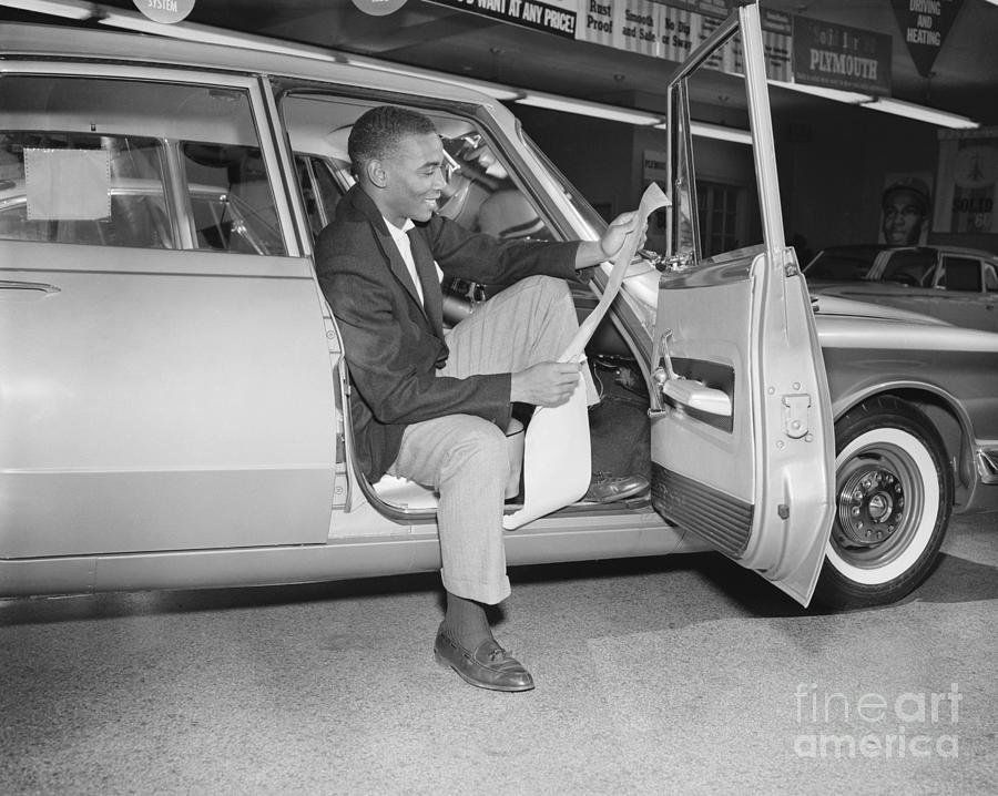 Ernie Banks Photograph - Ernie Banks Reading Press Release by Bettmann
