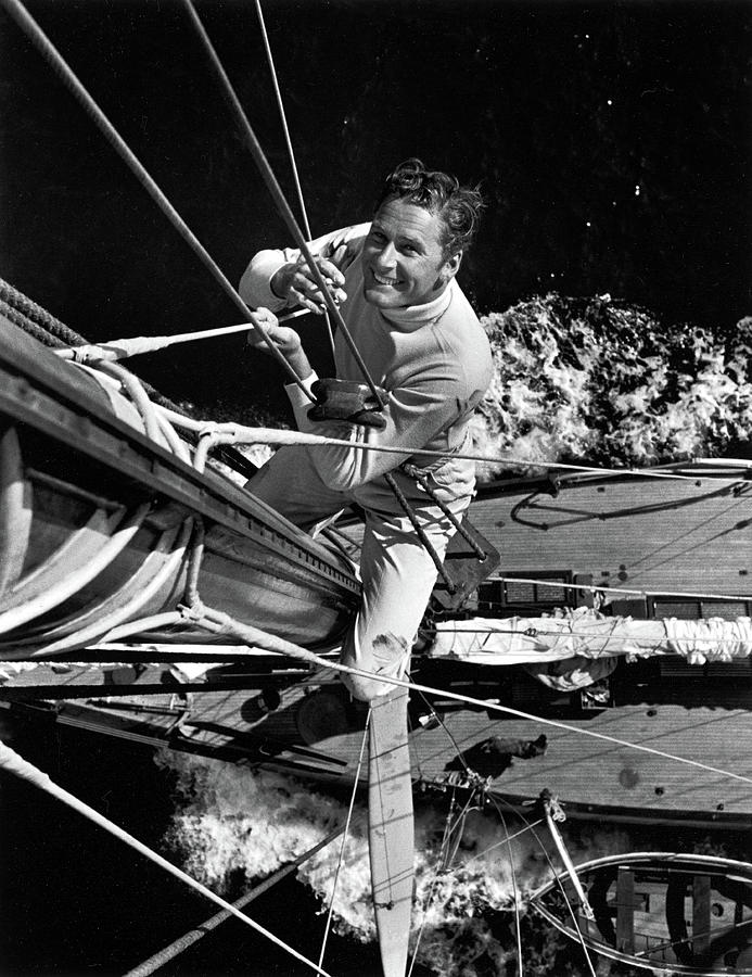 Errol Flynn Climbs A Mast Photograph by Peter Stackpole