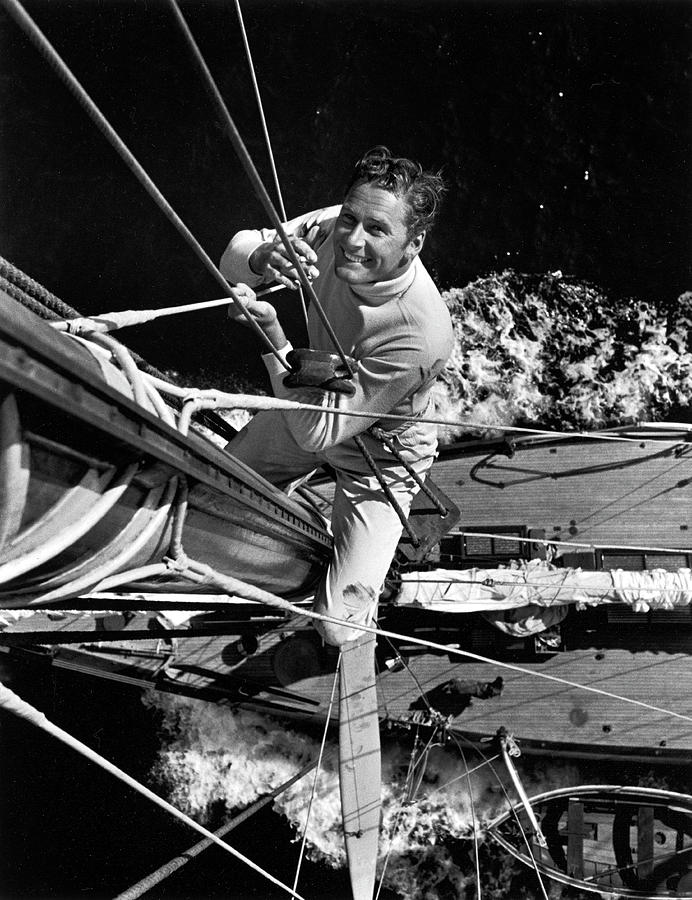 Errol Flynn Climbs The Mast Photograph by Peter Stackpole Errol Flynn Climbs The Mast Photograph by Peter Stackpole