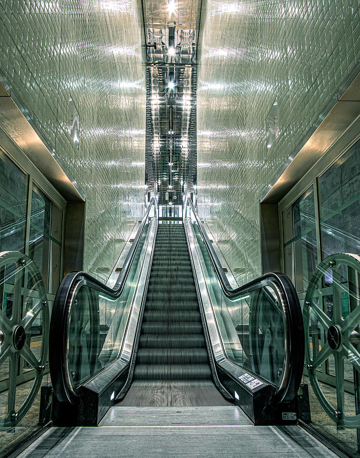 Escalator Going Downwards. Photograph by Fred Louwen