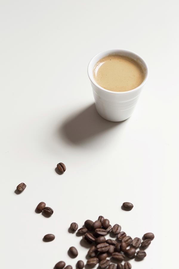 Espresso And Coffee Beans Photograph by Julia Cawley
