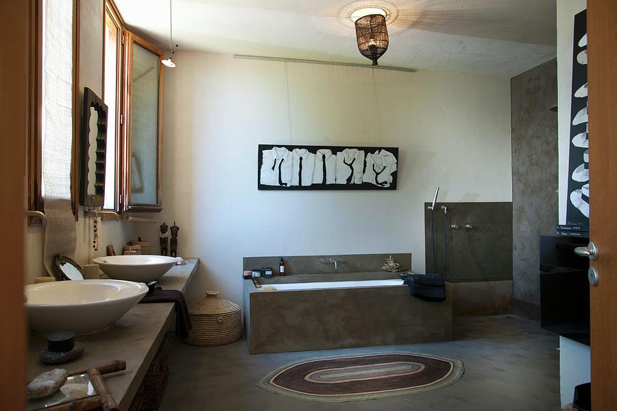 Ethnic-style Bathroom With Countertop Sinks, Masonry Bathtub And Open-plan Shower Area Photograph by Christophe Madamour