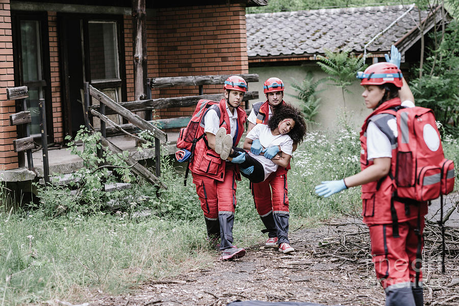First Aid Photograph - Evacuation From Disaster Struck Area by Microgen Images/science Photo Library