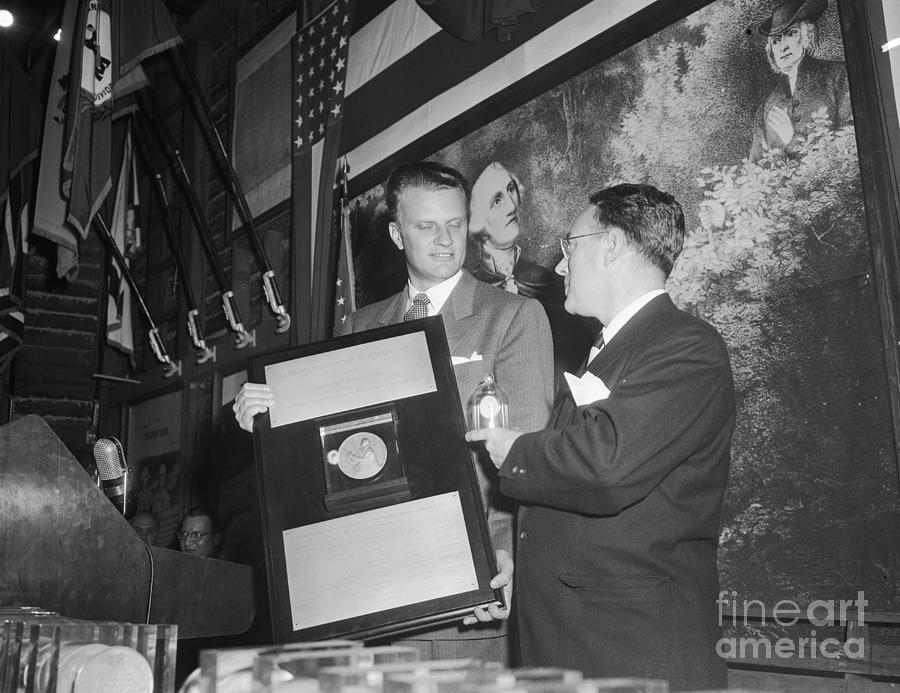 Evangelist Billy Graham Receiving An Photograph by Bettmann