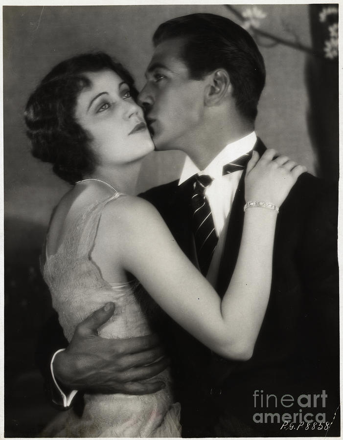 Evelyn Brent Being Kissed By Gary Cooper Photograph by Bettmann