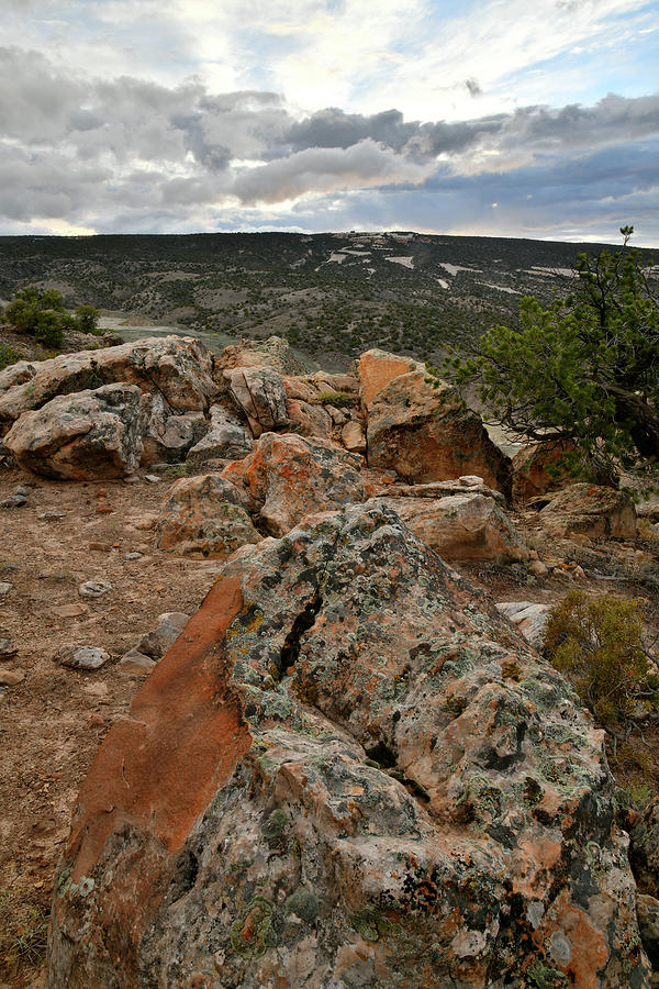 Evening Clouds above Bentonite Site Boulders Photograph by Ray Mathis