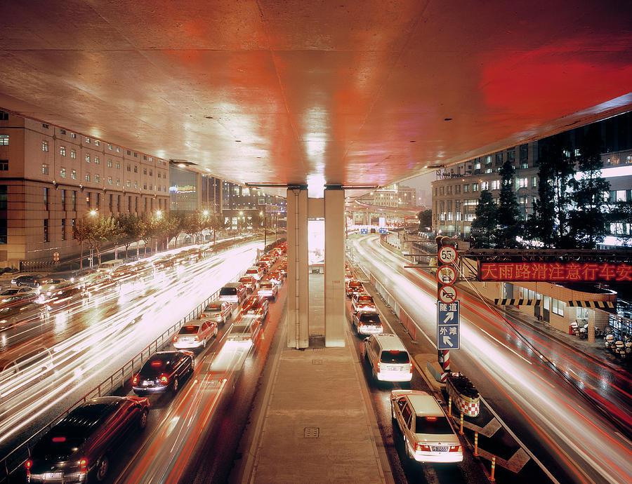 Evening Rush Hour Traffic In Shanghai Photograph by Eschcollection