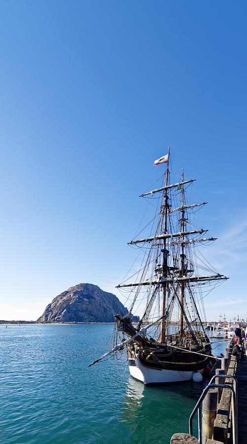 Every Lady Loves a Big Rock -- Sailing Ship Lady Washington and Morro Rock in Morro Bay, California Photograph by Darin Volpe
