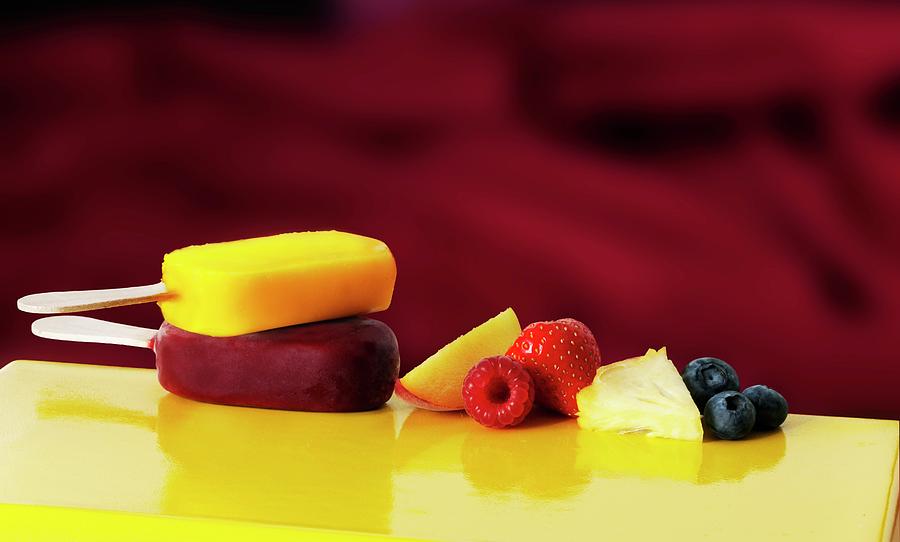 Exotic Fruit And Berry Ice Lollies Photograph by Frank Adam