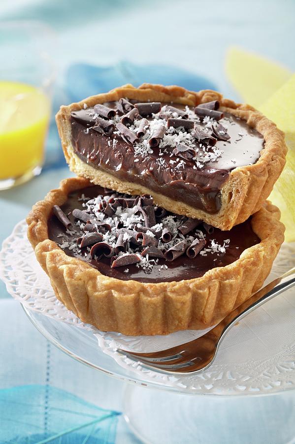Exotic Tartlets With Dark Chocolate Cream And Pineapple Photograph by Alessandra Pizzi