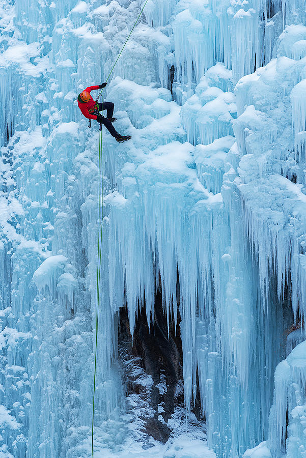 Winter Photograph - Exploring Ice Cliff by Mei Xu