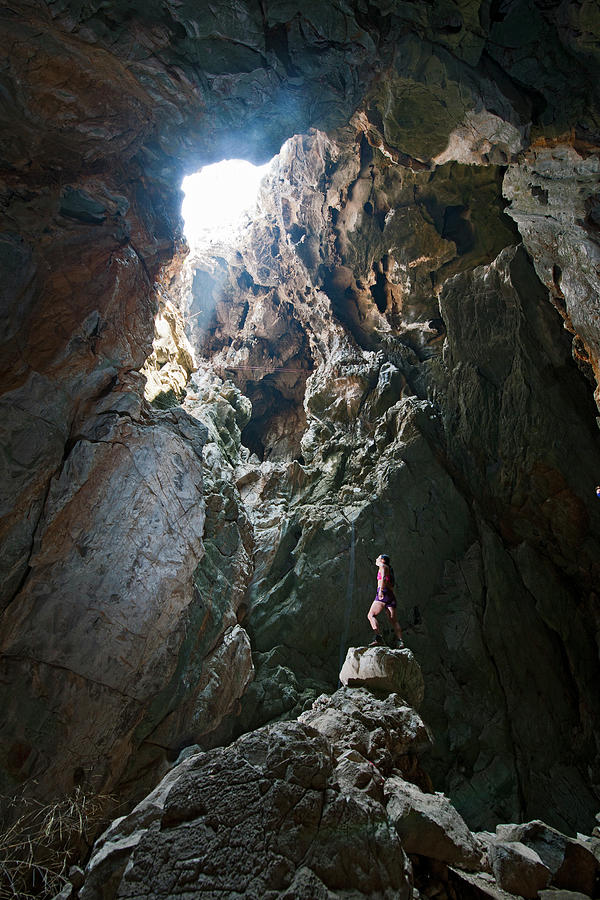 Cave Photograph - Exploring The Anxiety State Crisis Cave At Crazy Horse Buttress by Cavan Images